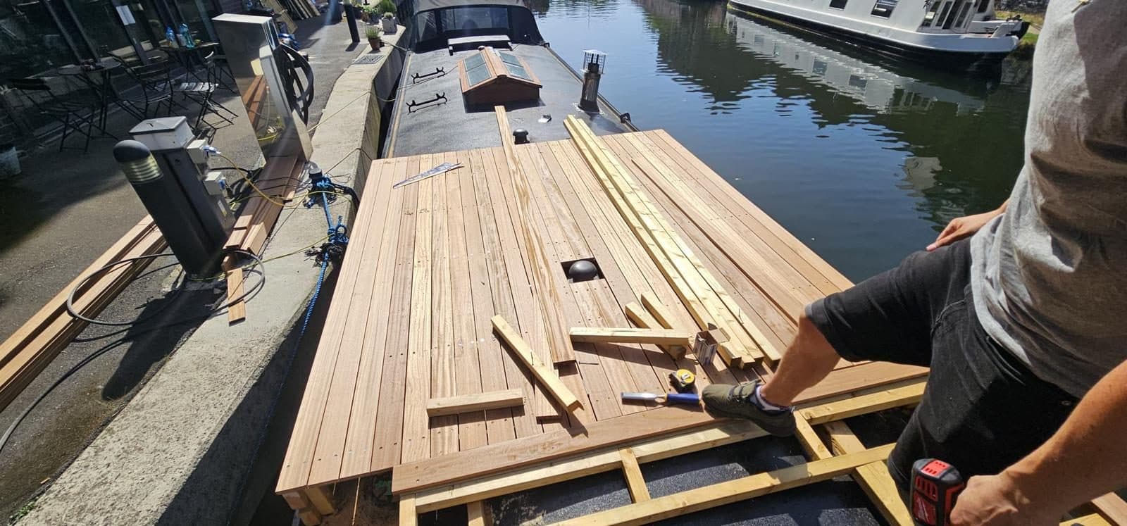 Hardwood boards being fixed down onto the softwood sub-frame